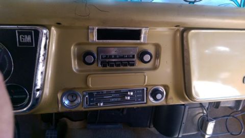 1968 Chevrolet C/K Pickup - The interior dashboard of a 1967 Chevrolet C/K Pickup features a period-correct radio and climate control system.