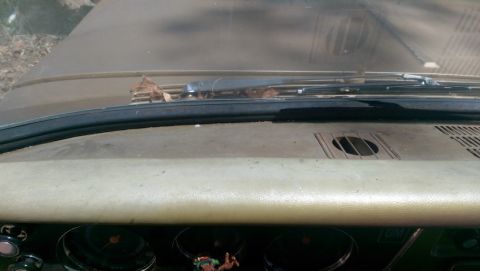 1968 Chevrolet C/K Pickup - A view from inside a vehicle shows the dashboard, windshield wipers, and a SuperMotors logo on the lower right.