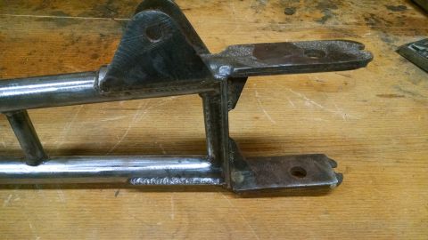 1992 Ford Bronco - This fabricated metal part appears to be a custom suspension component, possibly for off-road use.