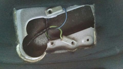 1992 Ford Bronco - Close-up of interior car part with exposed wiring and connectors.