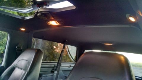 1992 Ford Bronco - Interior of a 1992 Ford Bronco, its sunroof and interior lighting.