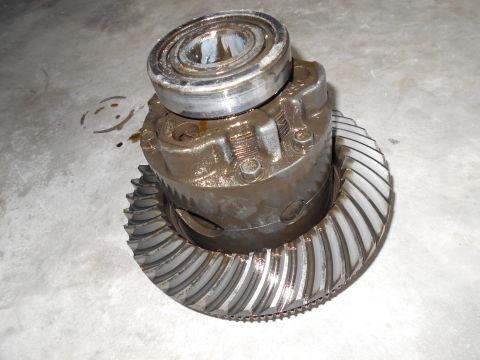 1992 Ford Bronco - Differential gear and bearing assembly shown on a concrete floor.