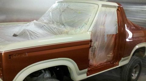 1982 Ford Bronco - This 1982 Ford Bronco is being prepped for a new paint job, with plastic covering most of the vehicle.