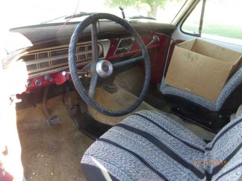 1970 Ford F-250 - Interior view of a 1970 Ford F-250, showing the dashboard, steering wheel, and seats.