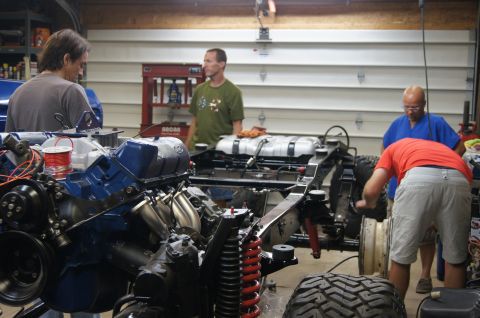 1979 Ford Bronco - The lift sqad John, Paul, Terry, Bob, Jeff. Lynda on the hoist and Nicole guiding and positioning.