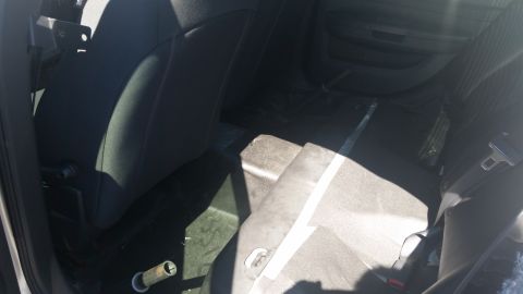 2001 Ford Crown Victoria - Interior view of a car, showing the back seats and floor area.