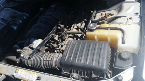2001 Ford Crown Victoria - Photo of an engine compartment, not a technical document.