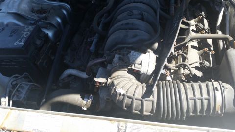 2001 Ford Crown Victoria - Photo of an engine compartment, not a technical document.