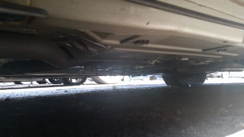 2001 Ford Crown Victoria - Photo of a vehicle undercarriage, not a technical document.