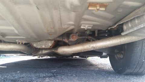 2001 Ford Crown Victoria - Photo of a vehicle undercarriage, not a technical document.