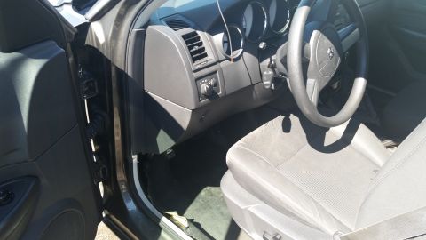 2001 Ford Crown Victoria - Photograph of a vehicle interior showing dashboard, gauges, and steering wheel, not a technical document.