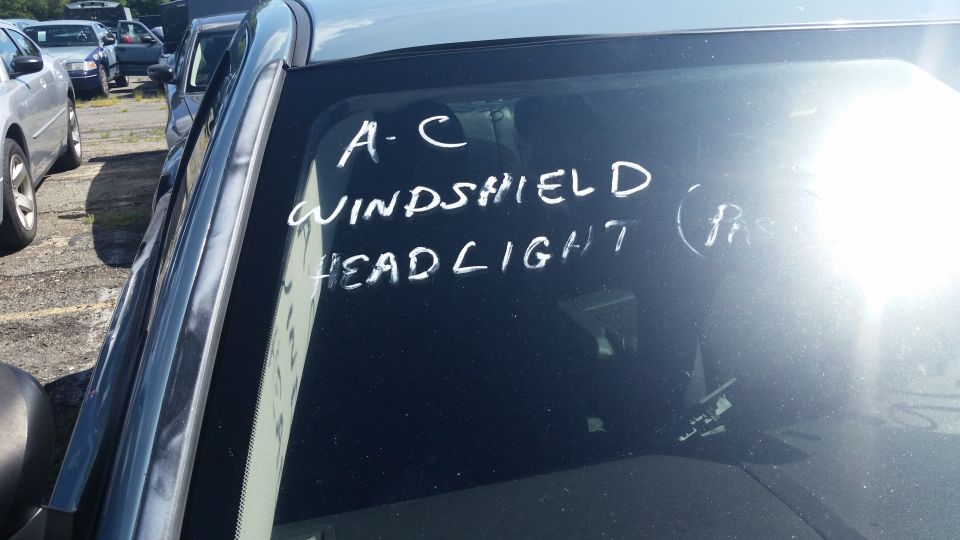 Windshield with handwritten labels A-C windshield headlight