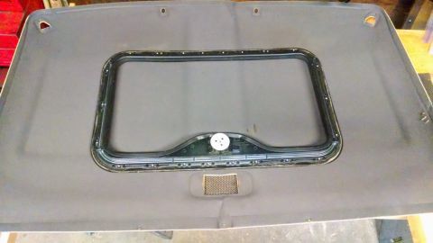 1992 Ford Bronco - Removed sunroof assembly from vehicle interior headliner.