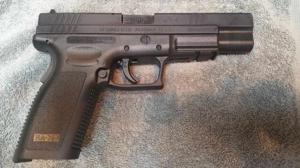 Springfield Armory XD pistol on a textured surface