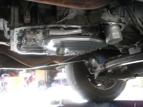 1994 Ford Bronco - Transmission pan and filter assembly shown during a fluid change service.