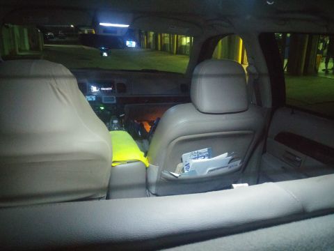 2000 Mercury Grand Marquis - The interior of a 2000 Mercury Grand Marquis is visible, with a focus on the front seats and dashboard area.