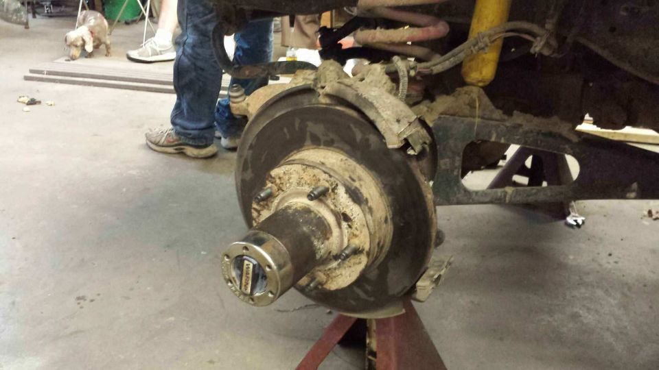 Front wheel hub assembly with visible 'Ford' text on the locking mechanism