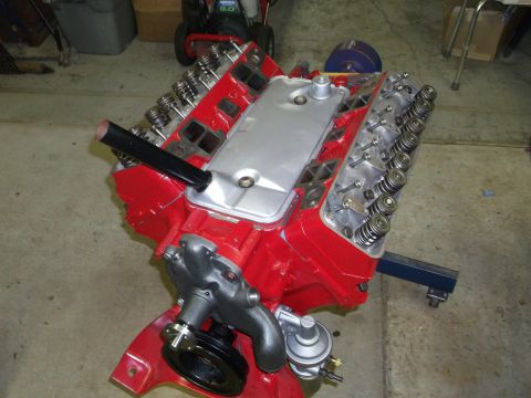 1957 Ford Custom Sedan - V8 engine on a stand, likely for a classic car restoration project.
