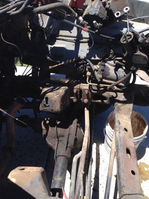1978 Ford Bronco - Close-up view of engine and chassis components, likely during a swap or repair.