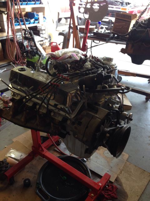 1978 Ford Bronco - Engine on a stand in a garage, likely for an engine swap. The registry claims it's a 1978 Ford Bronco engine, but this cannot be confirmed…