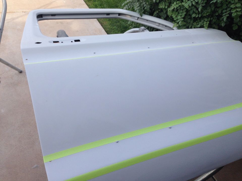 Passenger Side door in primer, final stages of body work almost ready to paint February. 14 2015