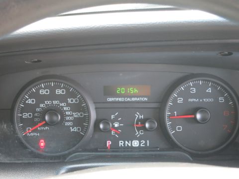 2001 Ford Crown Victoria - The dashboard displays mileage of 2015 and a "Certified Calibration" message.