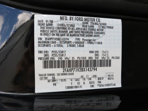 2001 Ford Crown Victoria - Ford Motor Co. door certification/data plate listing VIN, manufacture date, GVWR, tire and paint/trim codes.