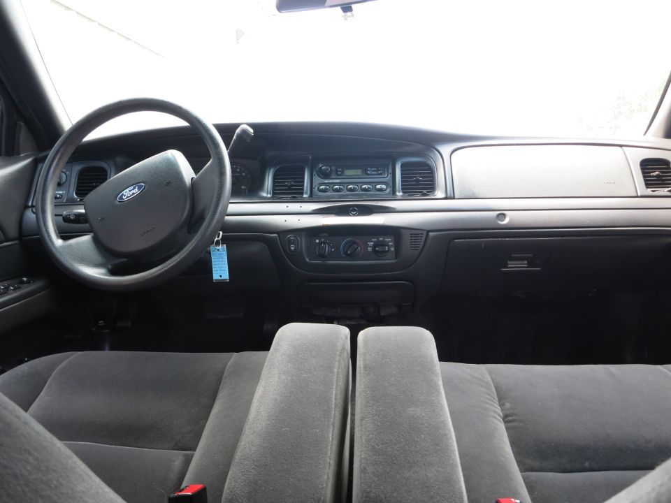 Interior view of 2001 Ford Crown Victoria dashboard and front seats