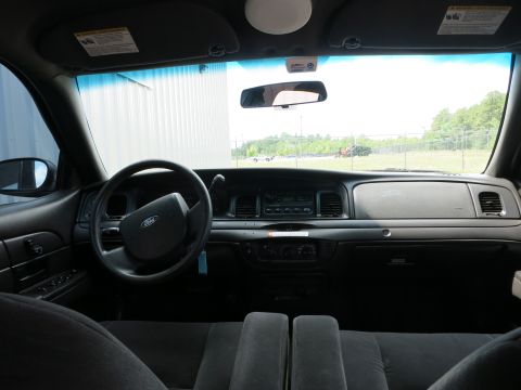 2001 Ford Crown Victoria - Interior view of a 2001 Ford Crown Victoria, looking towards the dashboard and front.