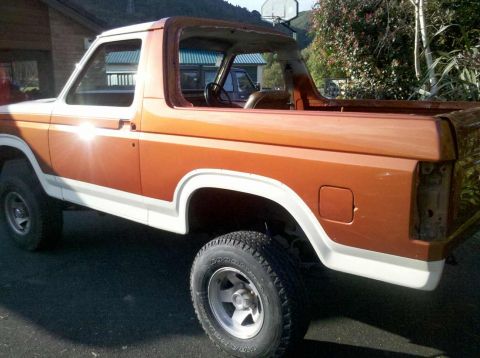 1982 Ford Bronco - This 1980s Ford Bronco is missing its rear taillight and appears to be undergoing some work.