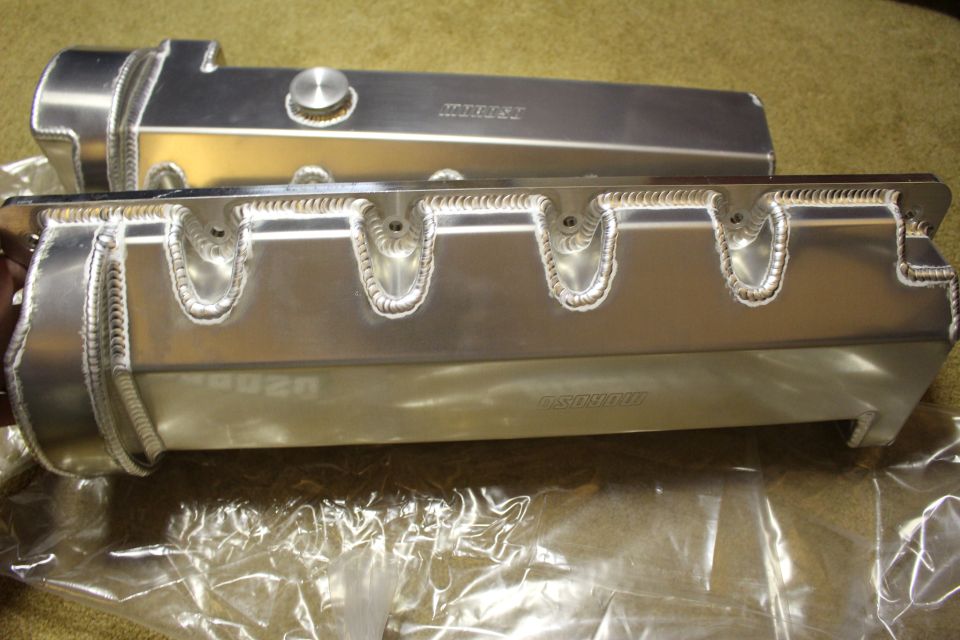 Polished aluminum valve cover and fabricated intake manifold with welded runners