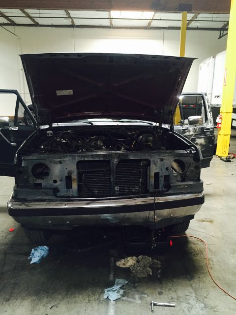 1988 Ford Bronco - This 1988 Ford Bronco is shown with its hood open and front grille removed, revealing the engine bay.
