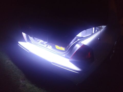 2000 Mercury Grand Marquis - The trunk of a 2000 Mercury Grand Marquis is lit up with bright white LED strips.