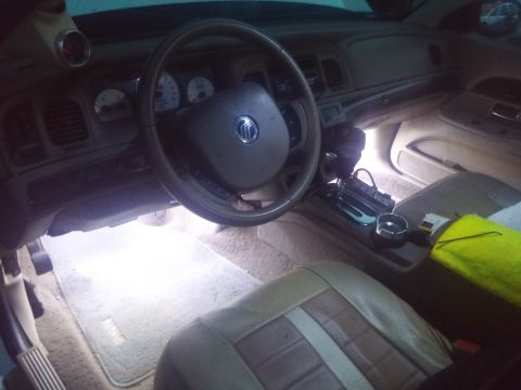 2000 Mercury Grand Marquis - Interior view of a 2000 Mercury Grand Marquis, highlighting the dashboard and seating.