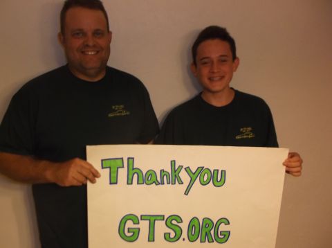 1979 Ford Ranchero - A sign reading 'Thank you GTS.ORG' is held by two smiling individuals.