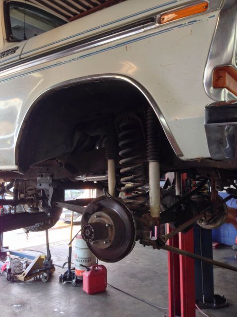 1979 Ford Bronco - Rear suspension and brake assembly of a 1979 Ford Bronco undergoing service.