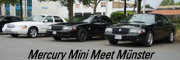 Three black 2003 Mercury Marauders parked side-by-side