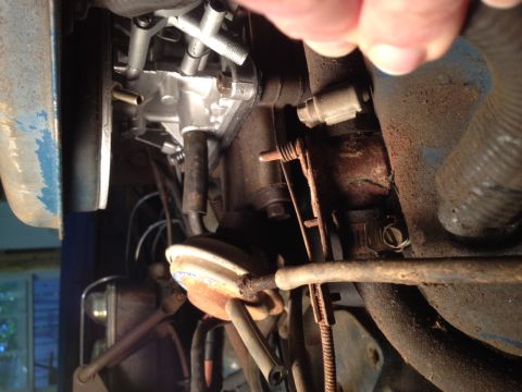 1973 Ford Bronco - Engine bay components, including a carburetor, are shown in this close-up view.