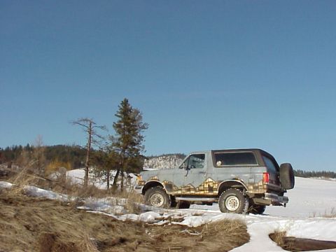 1989 Ford Bronco - This Ford Bronco, with its distinctive mountain graphics, is seen in a snowy landscape.