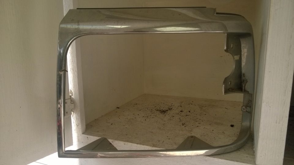 1994 Ford Bronco headlight bezel, chrome trim