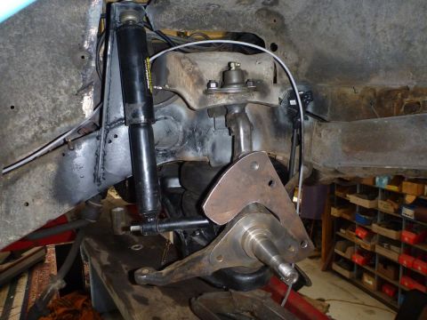 1964 Mercury Monterey - Front suspension components are visible, including a shock absorber and steering linkage.