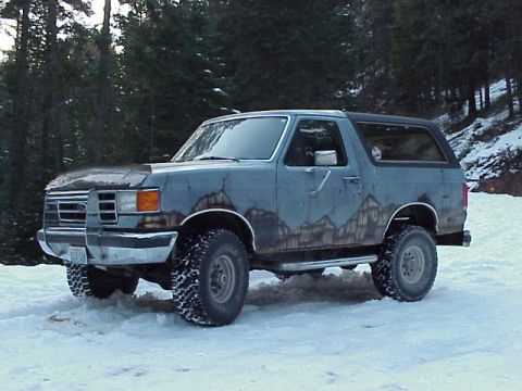 1989 Ford Bronco - This 1987 Ford Bronco is seen in a snowy environment, with its tires covered in snow.