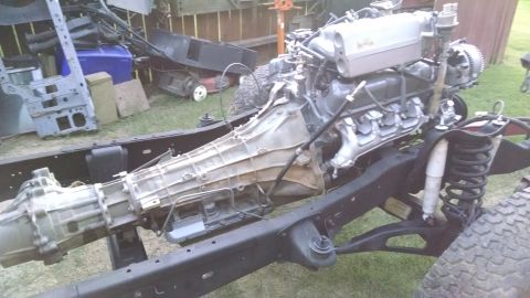 1993 Ford Bronco - The vacuum harness (which I plan to replace with color-matched silicone tubing) is on, and the trans dipstick tube has a fresh coat of pain…