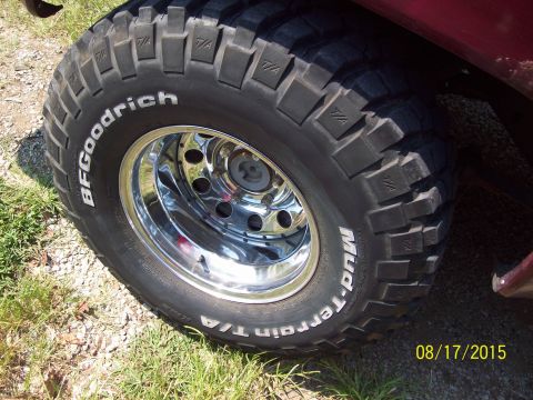 1989 Chevrolet Blazer - Close-up of a BFGoodrich Mud-Terrain T/A tire and chrome rim on a vehicle.