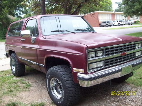 1989 Chevrolet Blazer - This 1989 Chevrolet Blazer is shown from a 3q-front angle, highlighting its maroon paint, chrome grille, and bumper.