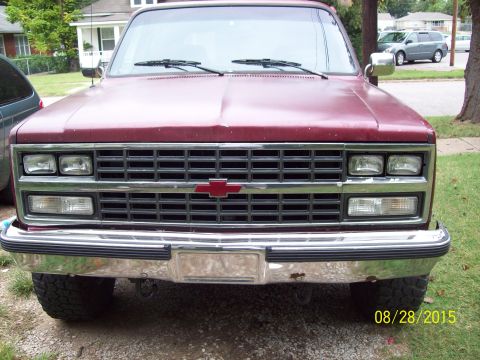 1989 Chevrolet Blazer - Front view of a red Chevrolet pickup truck, likely from the late 1980s.