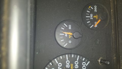 1994 Jeep Grand Cherokee - Close-up of the dashboard gauges, displaying oil pressure and engine temperature readings.