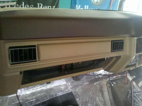 1982 Ford Bronco - Interior view of a vehicle dashboard, showing air vents and wiring during what appears to be a rebuild.