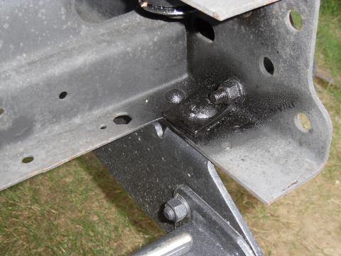 1993 Ford Bronco - The rear carriage bolts are from the JY, and I welded them to their square-punched plates to keep them from spinning. I also had to remove…