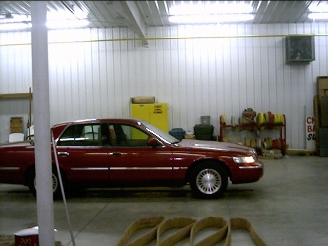 2000 Mercury Grand Marquis parked inside a garage
